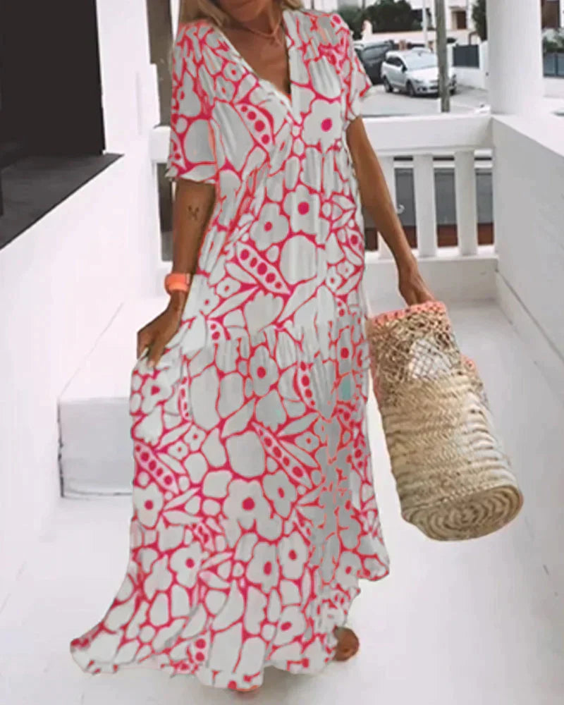 VESTIDO FLUIDO CON ESTAMPADO Y ESCOTE EN V